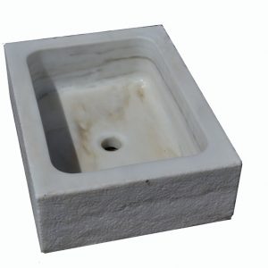 Fregador de piedra natural en blanco. Funcional y estético, solo su material ya aporta protagonismo.